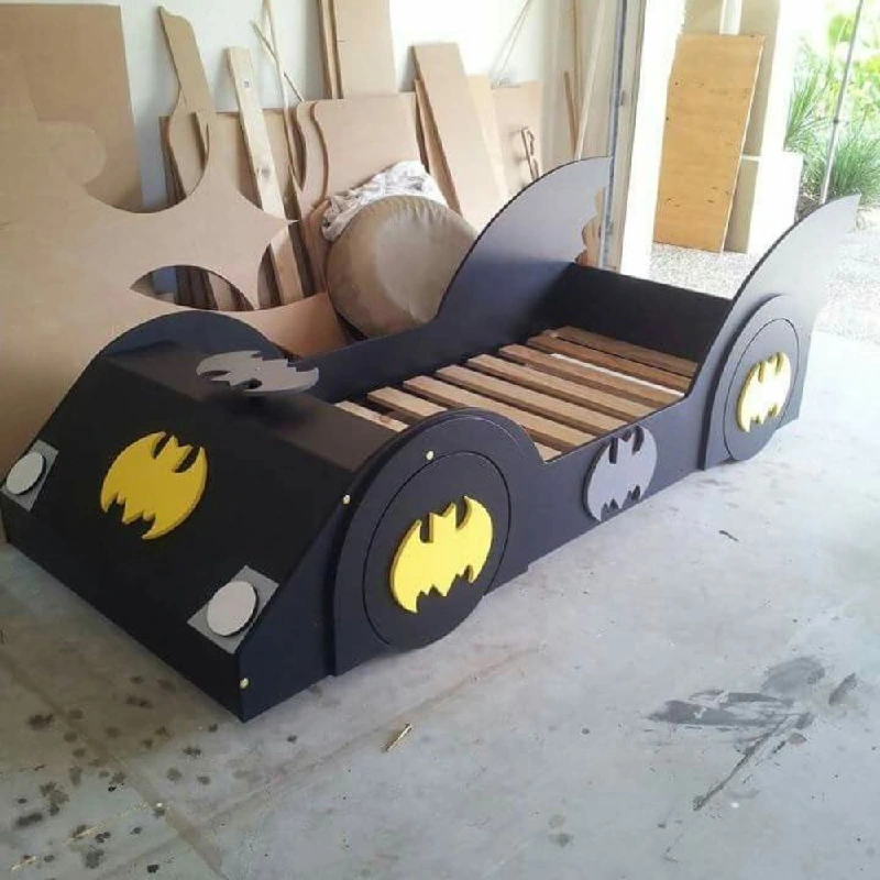 A Batman-themed wooden bed frame.