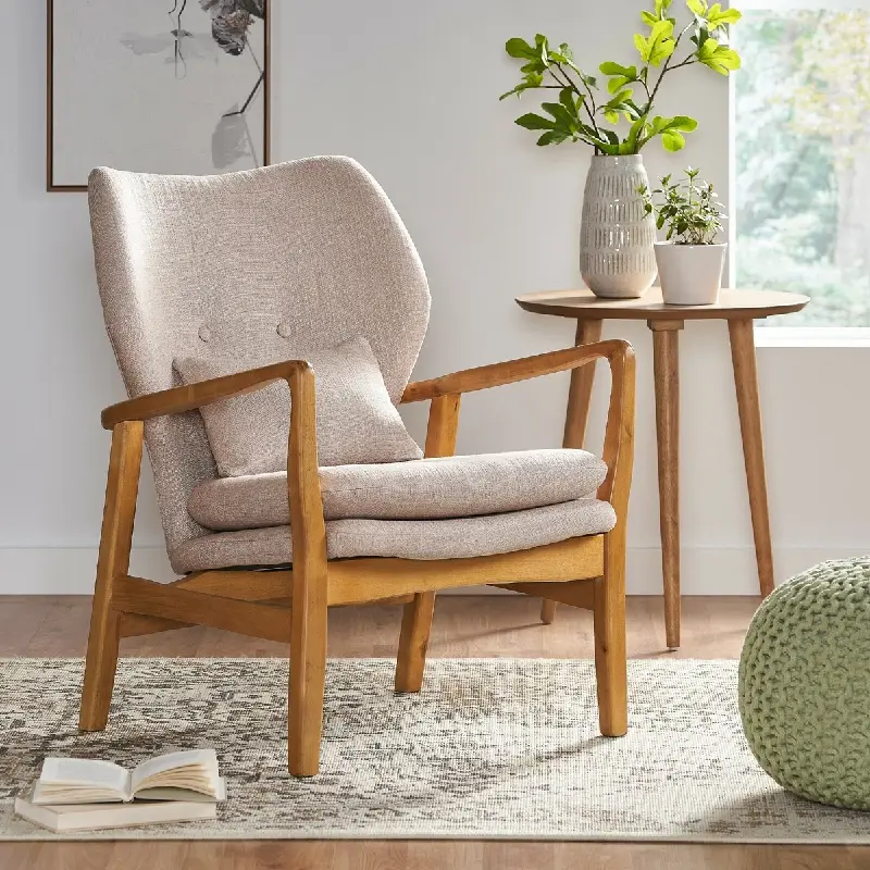 Modern armchair with light gray seat and back cushions