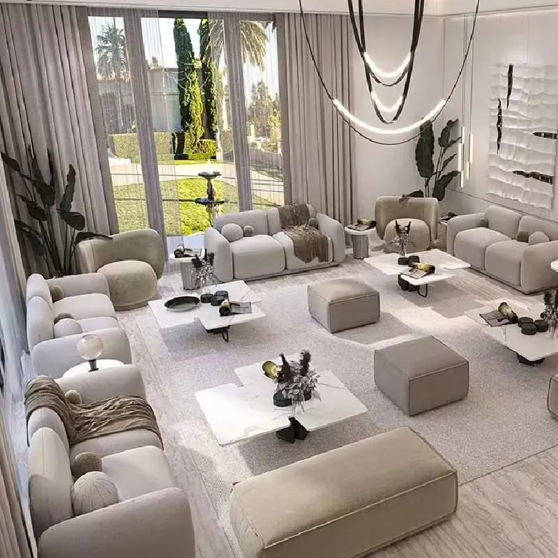 Modern ladies majlis with a light color palette, featuring a plush sofa