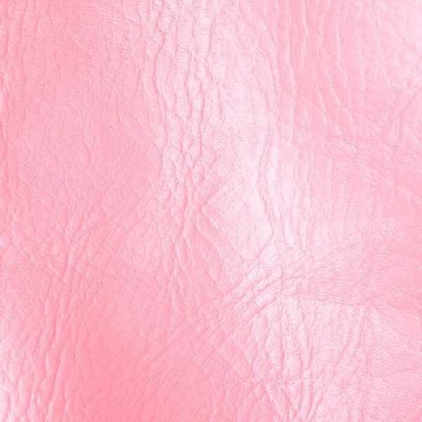 Pale pink textured leather upholstery fabric.
