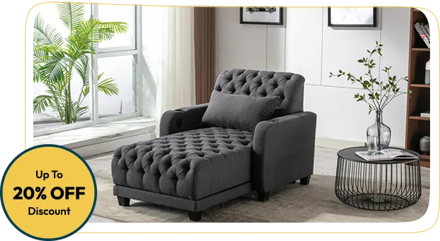 dark gray tufted chaise lounge with a cushion