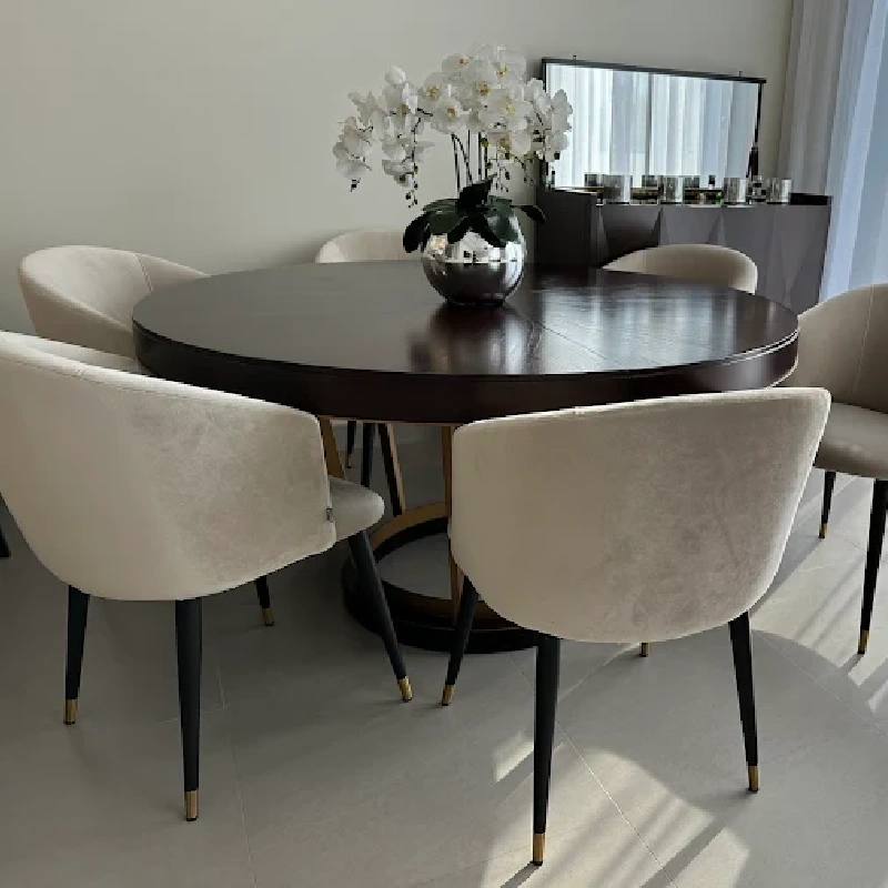 dining chair with light-colored, velvety upholstery