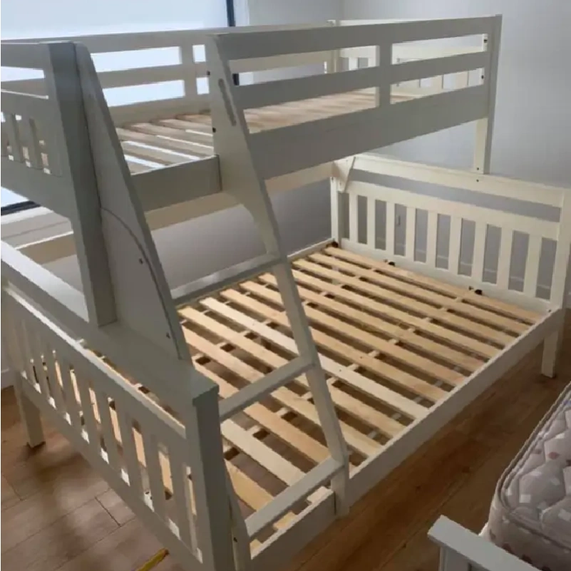 partially assembled white wooden bunk bed with slatted bed frames