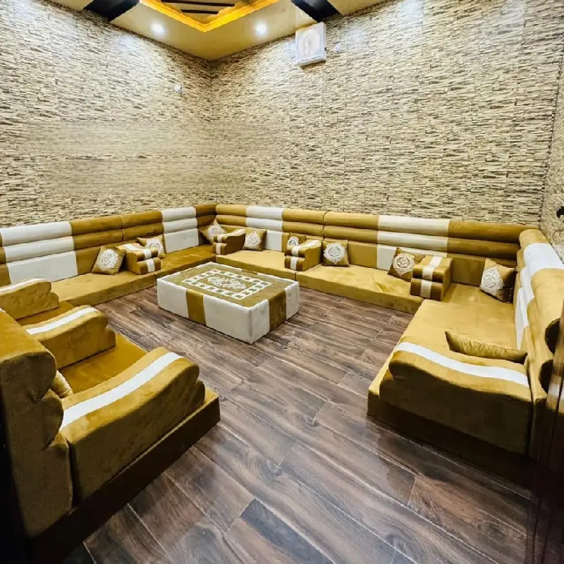 traditional Arabic majlis, featuring low-lying seating cushions in a U-shape
