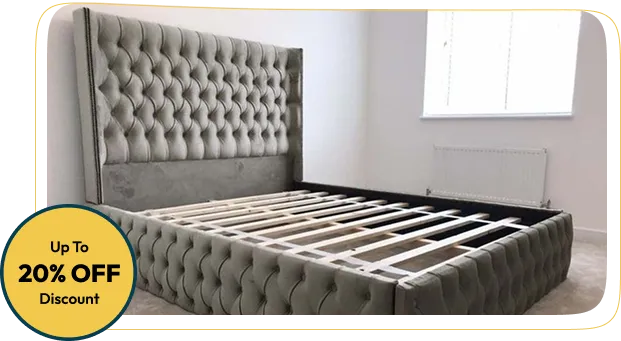 tufted upholstered bed frame with a large headboard