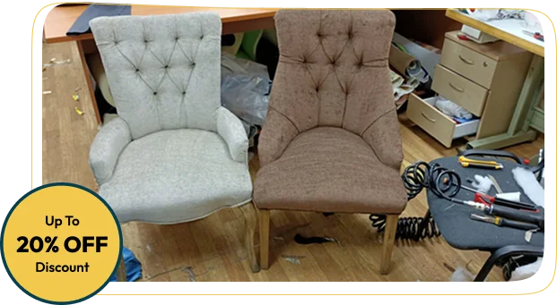 white and a brown upholstered chair, both featuring a button tufted back
