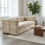 Beige crushed velvet sofa in bright modern living room