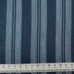 Blue striped upholstery fabric swatch with ruler detail