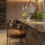 Brown velvet bar stool seats at a marble home bar counter