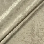 Close up macro texture shot of beige crushed velvet cloth