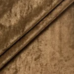 Close up macro texture shot of brown crushed velvet cloth