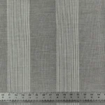 Grey striped upholstery fabric swatch with ruler detail