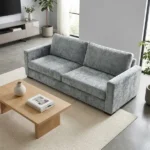 Grey velvet sofa in bright minimalist living room setting