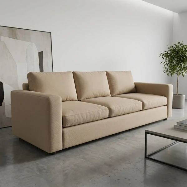 Modern beige fabric upholstered sofa in minimalist room