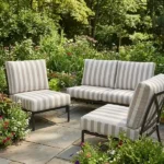 Outdoor garden patio furniture with beige striped seats