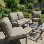 Outdoor patio conversation set with taupe cushion seats