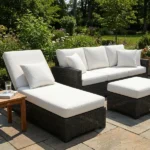 Outdoor patio wicker sofa set with white cushion upholstery