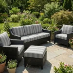 Outdoor wicker patio furniture with grey striped seats